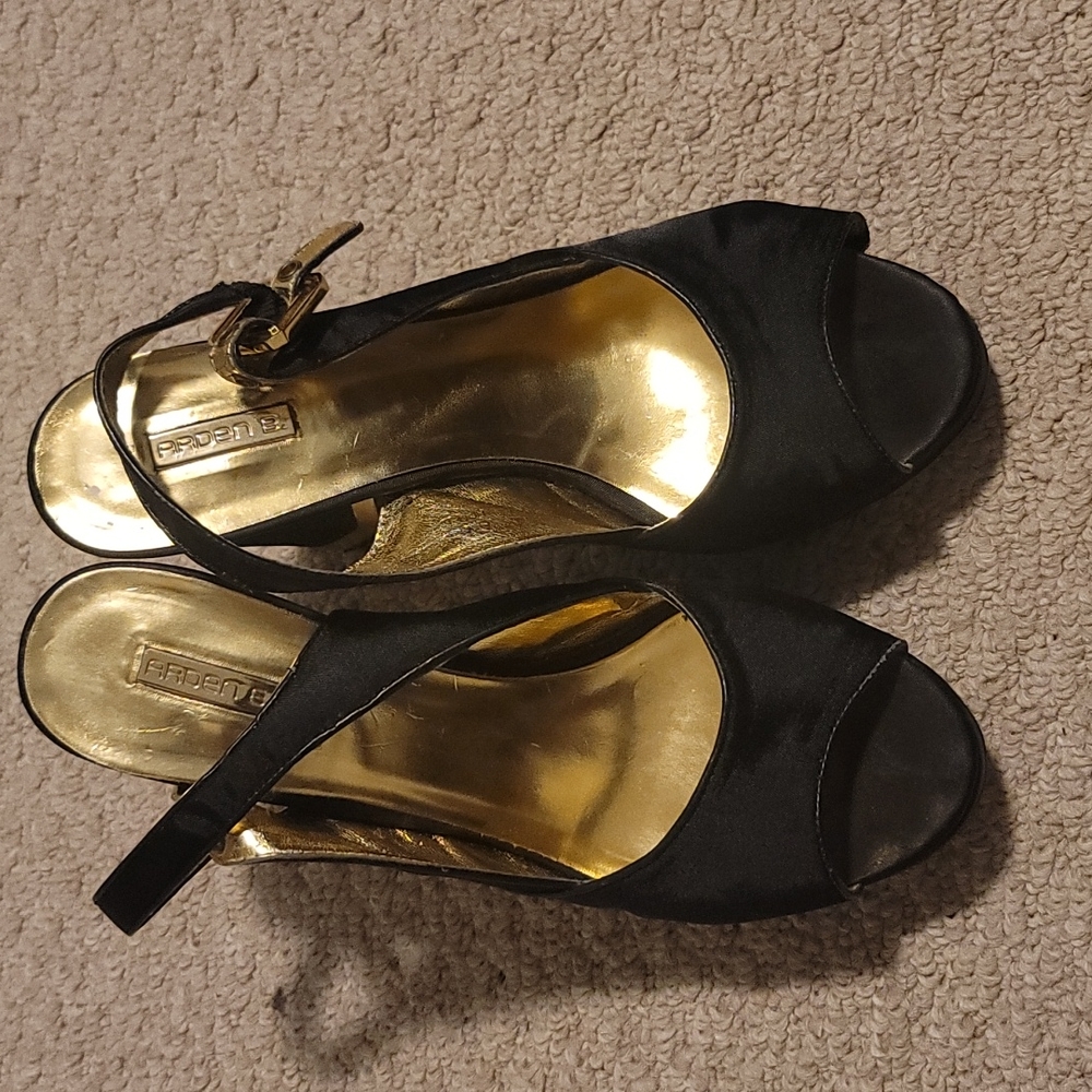 Black and gold heels
